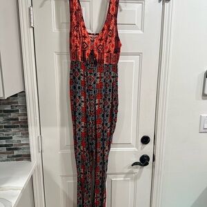 Free People Flare Cut-Out Lace Up NWT Geometric Jumpsuit